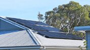 Rooftop-solar-tin-roof-iStock-1496516986-copy.jpg